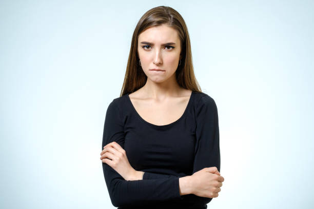 istock Young upset woman. Isolated on white background. Studio shot 688107414