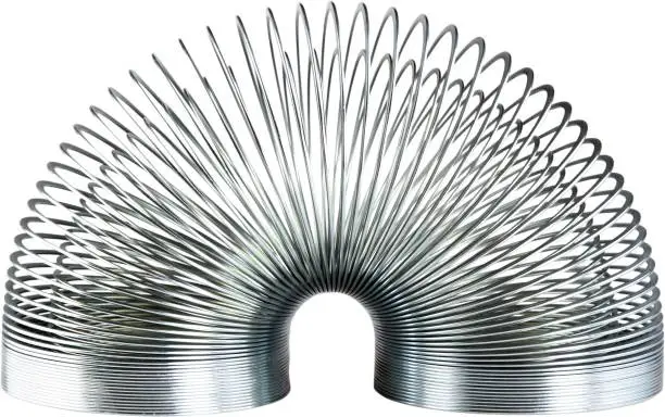 Metal Spring in an Arc Position Isolated on a White Background