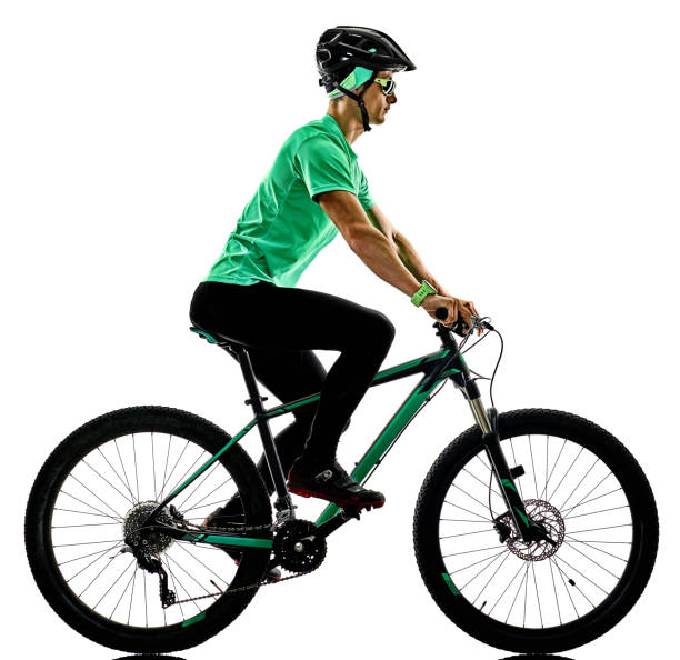 one caucasian man practicing man mountain bike bking isolated on white background with shadows