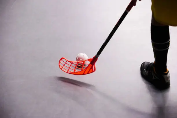 Stick and ball games in floorball.