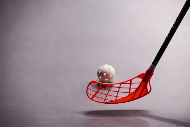 Stick and ball games in floorball.