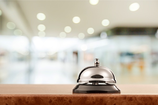 Vintage hotel reception service desk bell.