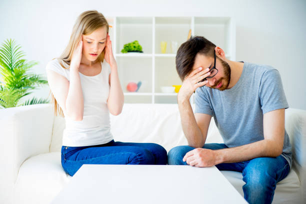 istock Loving couple swears on the sofa 688120734