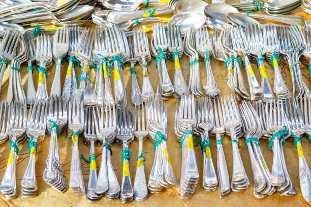 istock Antique silver cutlery on display at Old Spitalfields Market 688127610