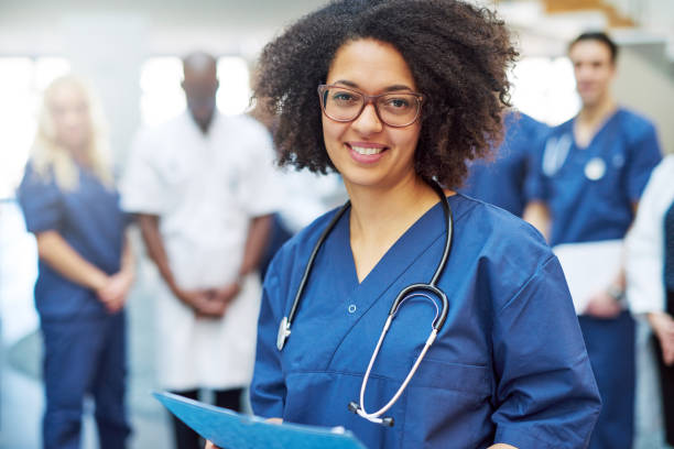 istock Pretty black doctor standing in the clinic 688135876