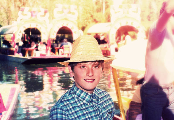 istock Boy in a boat in Xochimilco, Mexico 688138490