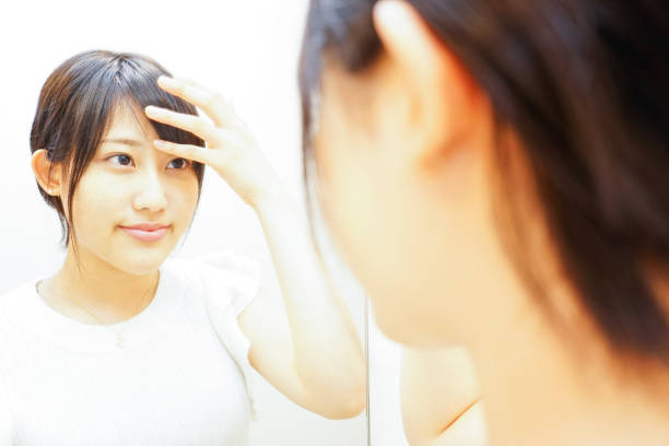 istock Women in front of the mirror 688144038