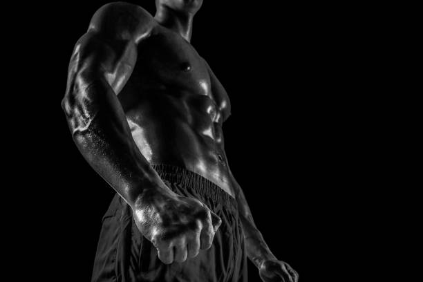 istock Part of a man's body on a dark background with copyspace 688160536
