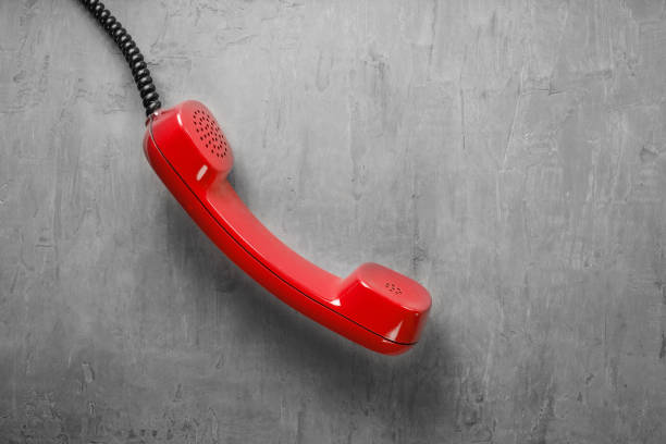 istock handset from landline phone on the background wall 688163538