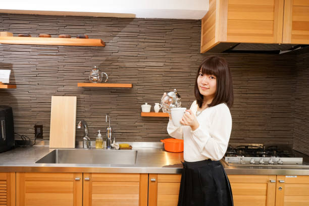 Woman with pot and Cup