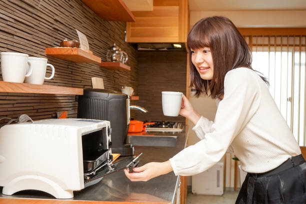 istock Women use the oven 688199760
