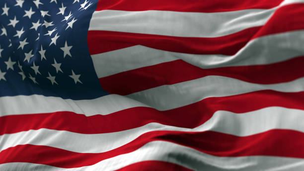 istock USA Flag Blowing on the Wind 688214638