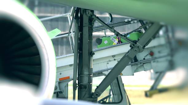 istock Baggage being unloaded from the commercial airplane 688226080