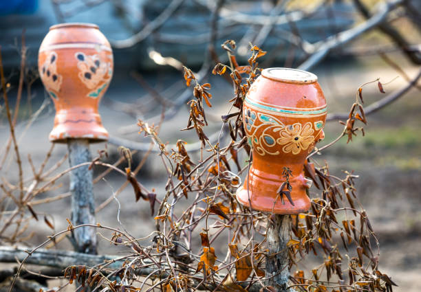 Clay pitchers on the fence, traditional Ukrainian style