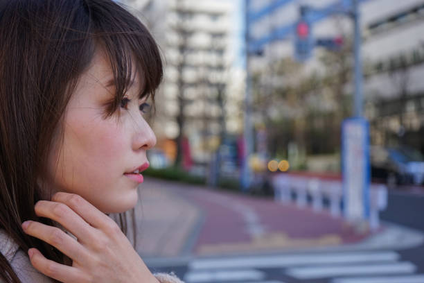 istock Woman on a street corner. 688242886