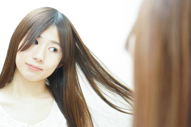istock Women in front of the mirror 688252702