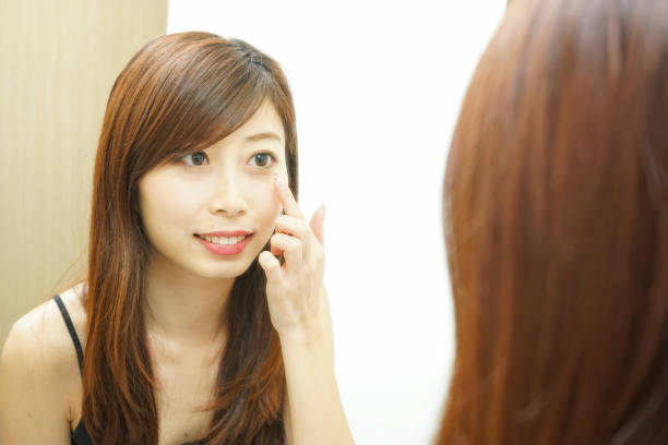 istock Women in front of the mirror 688256034