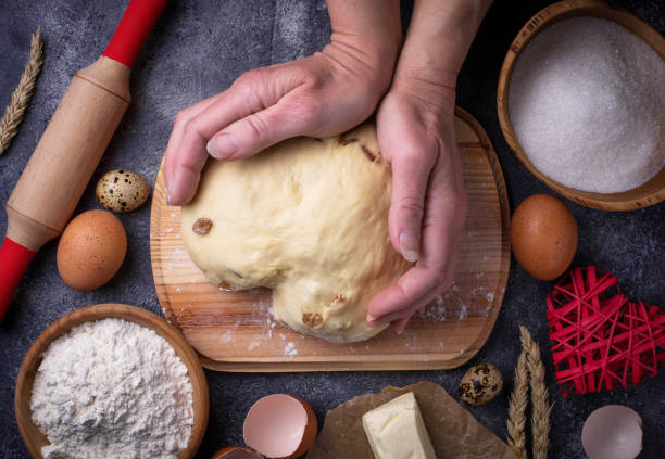 istock Female hands knead the dough. Backing concept 688256464