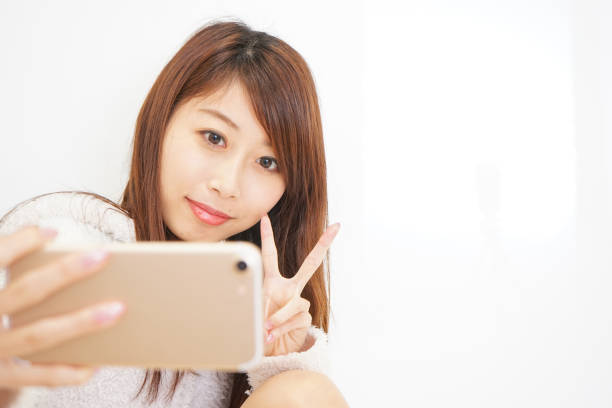 istock Woman with a Smartphone 688260896