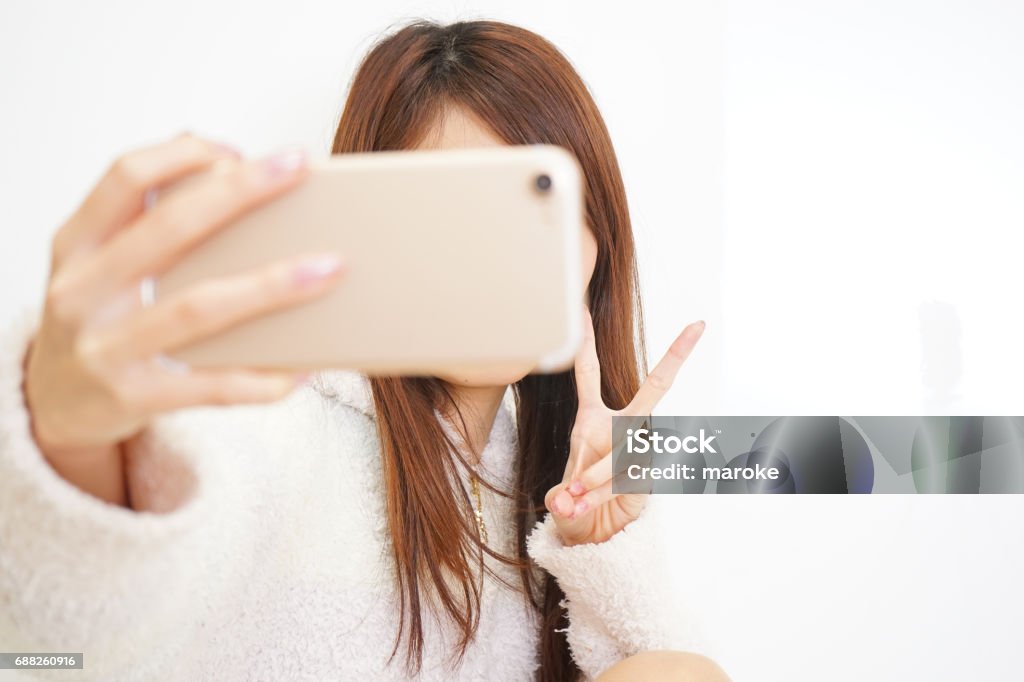 Woman with a Smartphone 20-24 Years Stock Photo