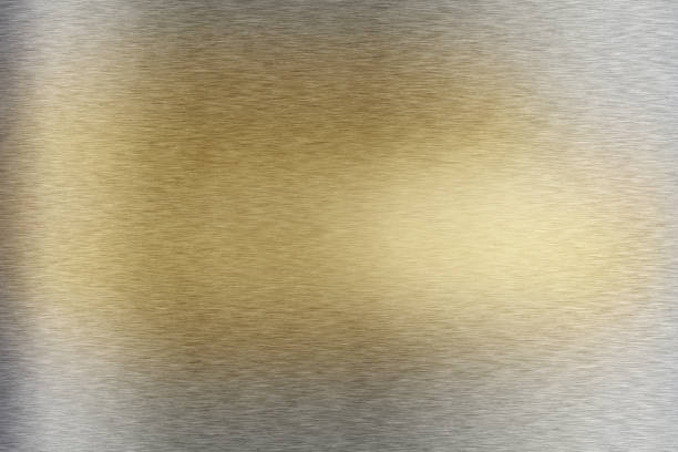istock Brushed steel plate background texture,gold center 688261220