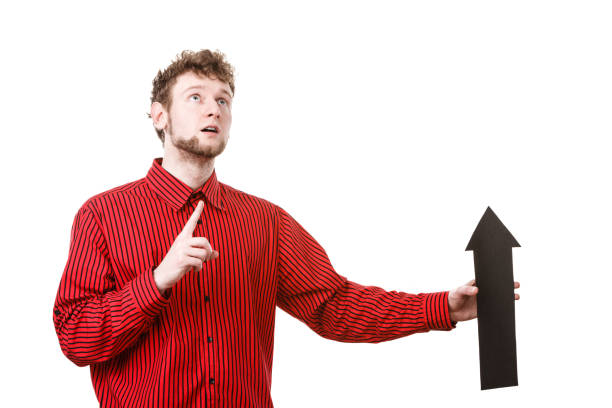 istock Man with arrow sign show right direction. 688261608