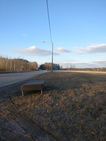 An Old Bed left near a Highway in Finland