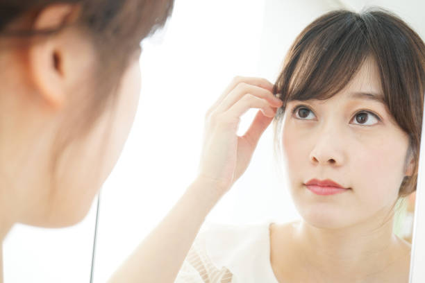 istock Women in front of the mirror 688274446