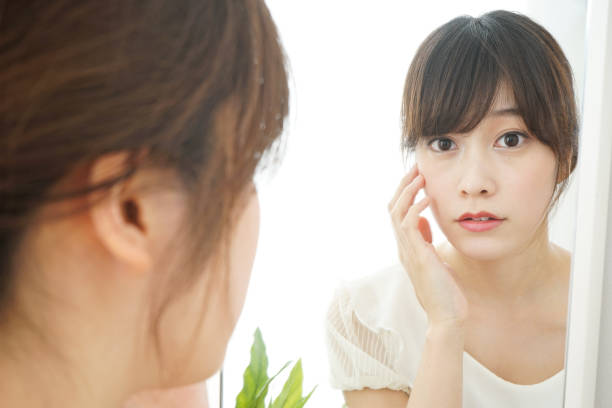 istock Women in front of the mirror 688274472