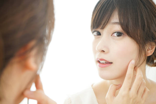 istock Women in front of the mirror 688274506