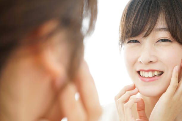 istock Women in front of the mirror 688274546