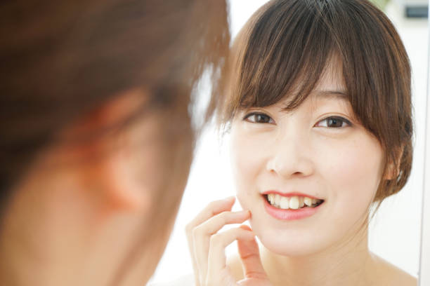 istock Women in front of the mirror 688274572