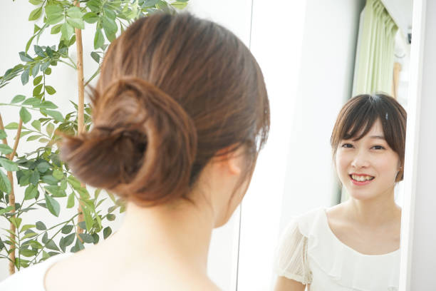 istock Women in front of the mirror 688274690