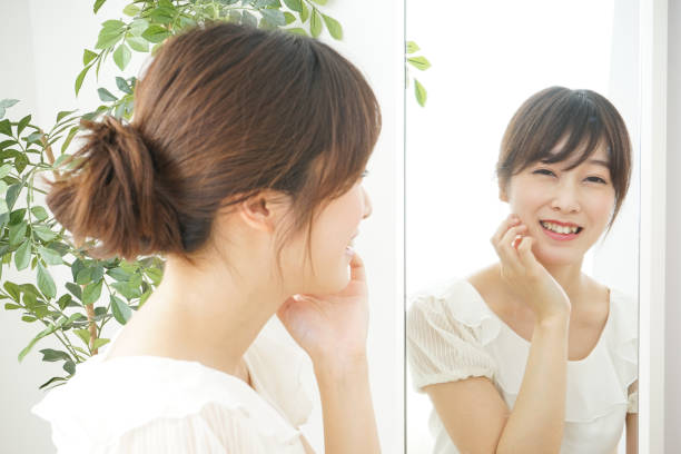 istock Women in front of the mirror 688274744