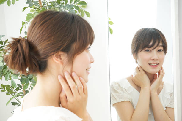istock Women in front of the mirror 688274782