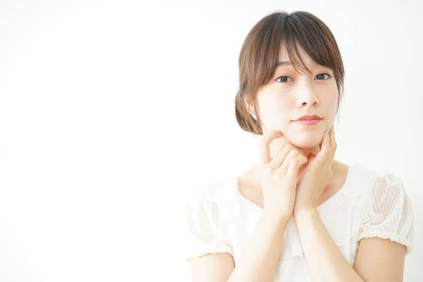 istock Woman touching face 688274984
