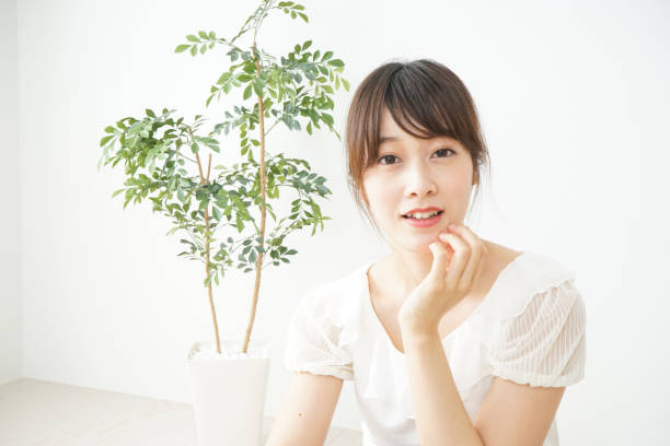 istock Woman touching face 688275356