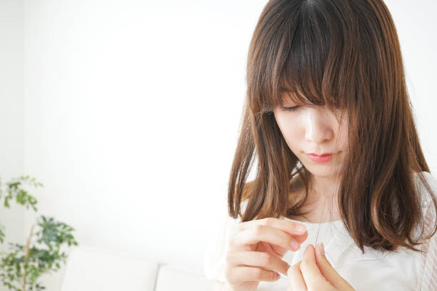 istock Woman touching her hair 688275568