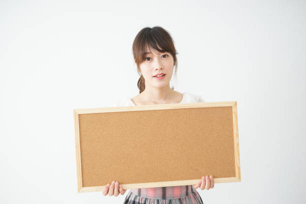 istock Woman with a corkboard 688277760