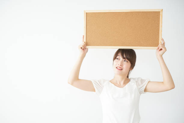 istock Woman with a corkboard 688277792