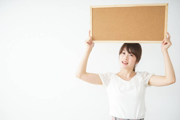 istock Woman with a corkboard 688277794