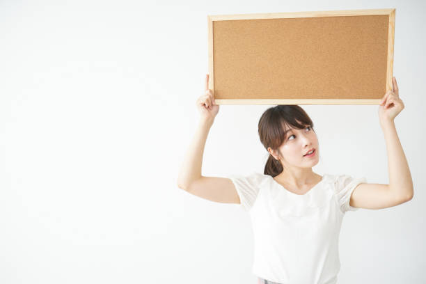 istock Woman with a corkboard 688277798
