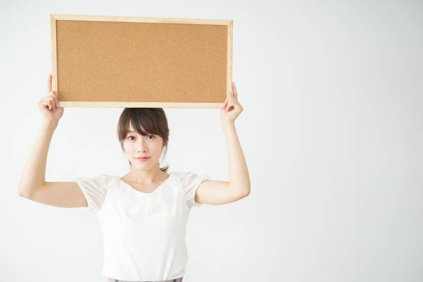 istock Woman with a corkboard 688277806