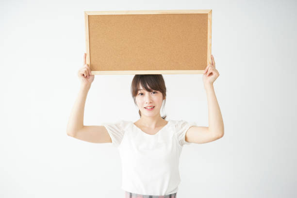 istock Woman with a corkboard 688277808