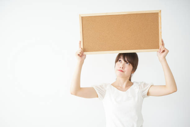 istock Woman with a corkboard 688277820