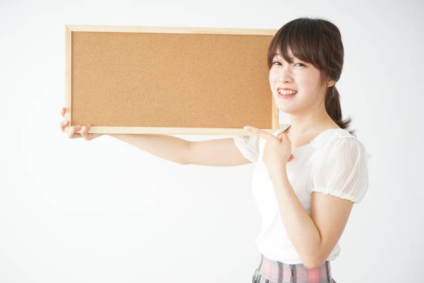 istock Woman with a corkboard 688277914