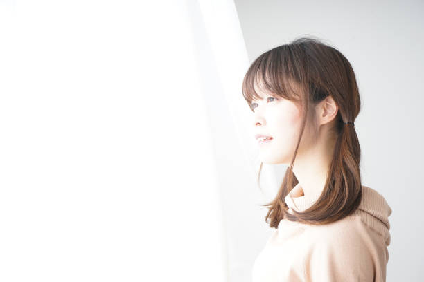 istock Curtains and woman 688282630