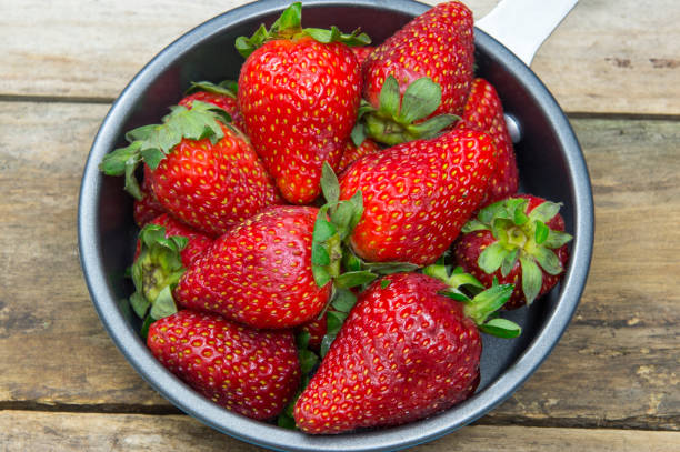 istock Group of Strawberry on wooden table 688282734
