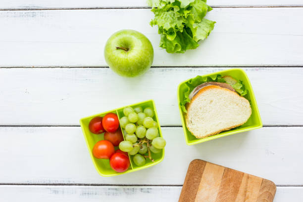 istock take away with lunchbox and fresh food on white background top view 688290358