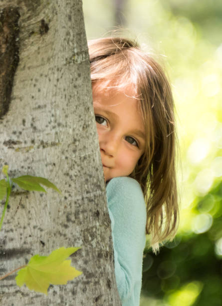 istock Smiling shy little girl 688298676